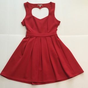 CHARLOTTE RUSSE red swing dress size Medium. Heart cutout back.